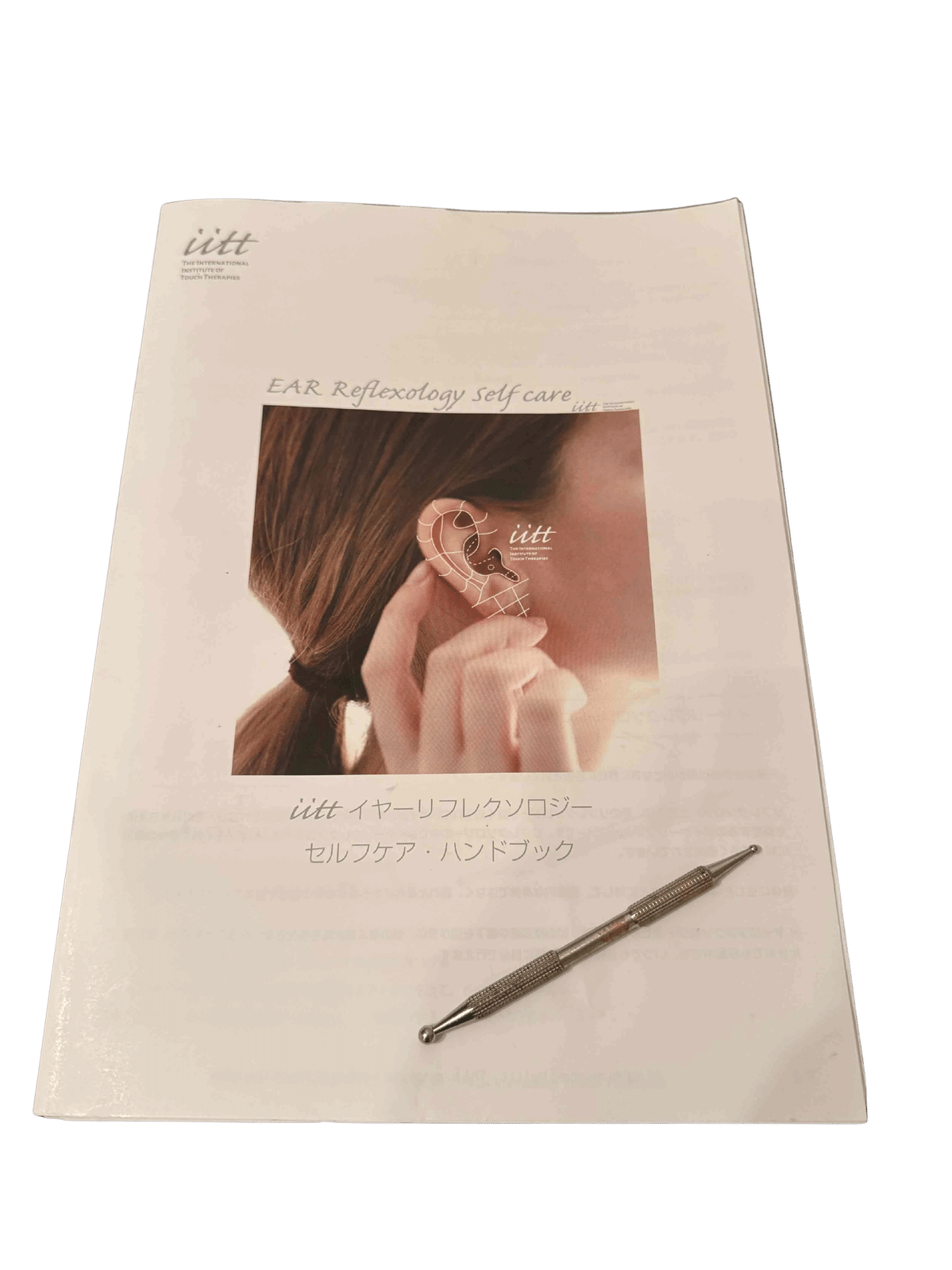 講座でお届けする実物のテキストと施術スティック